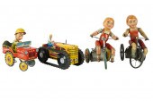 FOUR ASSORTED TIN TOYSincludin