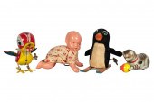 FOUR ASSORTED WIND-UP TOYSincl