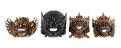 FOUR BALINESE CARVED WOODEN MA