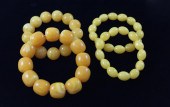 FOUR BALTIC AMBER BRACELETS, E