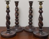 FOUR BARLEY TWIST CANDLESTICKS