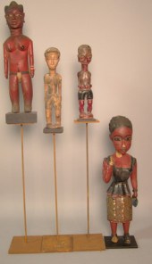 FOUR BAULE COLON ART CARVINGS