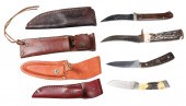 Four belt knives in leather sh