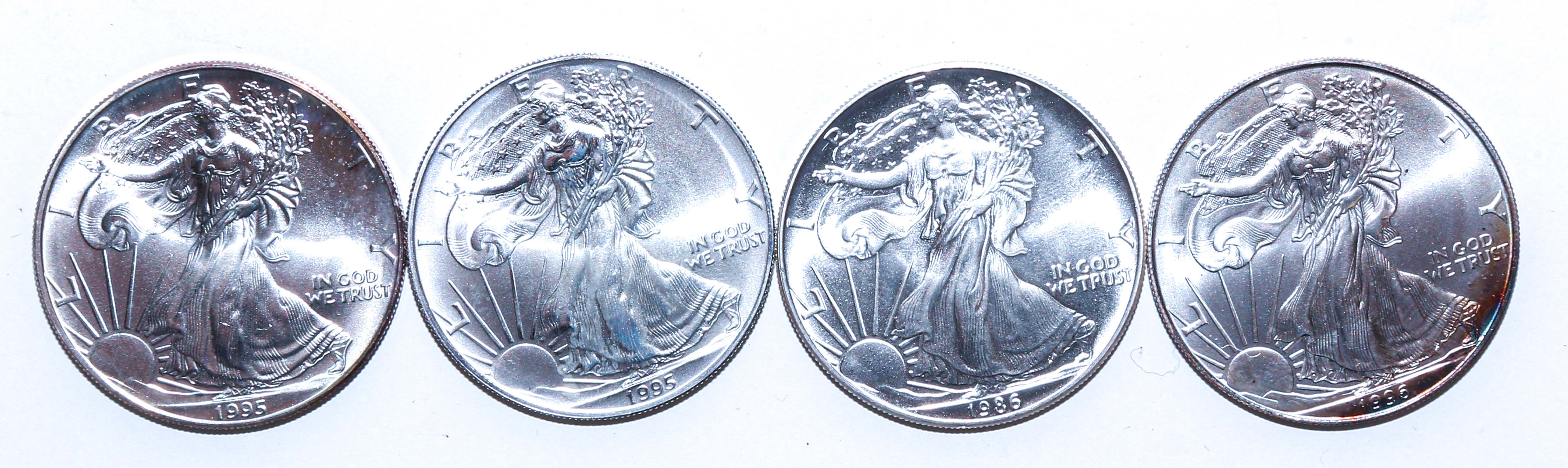 FOUR BETTER STATE SILVER EAGLES