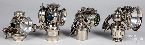 FOUR BICYCLE LAMPS, CA. 1900Four