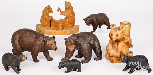 FOUR BLACK FOREST STYLE CARVED