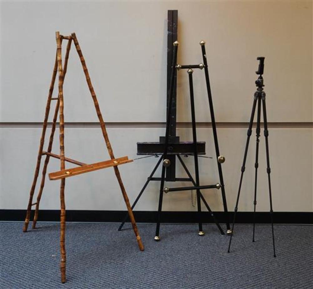 FOUR BLACK METAL PAINTING EASELS, A