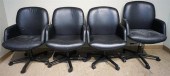 FOUR BLACK VINYL UPHOLSTERED S