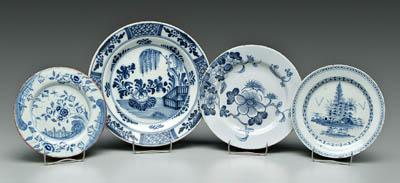 Four blue and white Delft plates: