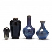 FOUR BLUE GLAZED POTTERY VASES