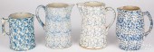 FOUR BLUE SPONGEWARE PITCHERS,