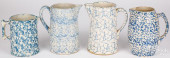 FOUR BLUE SPONGEWARE PITCHERS,