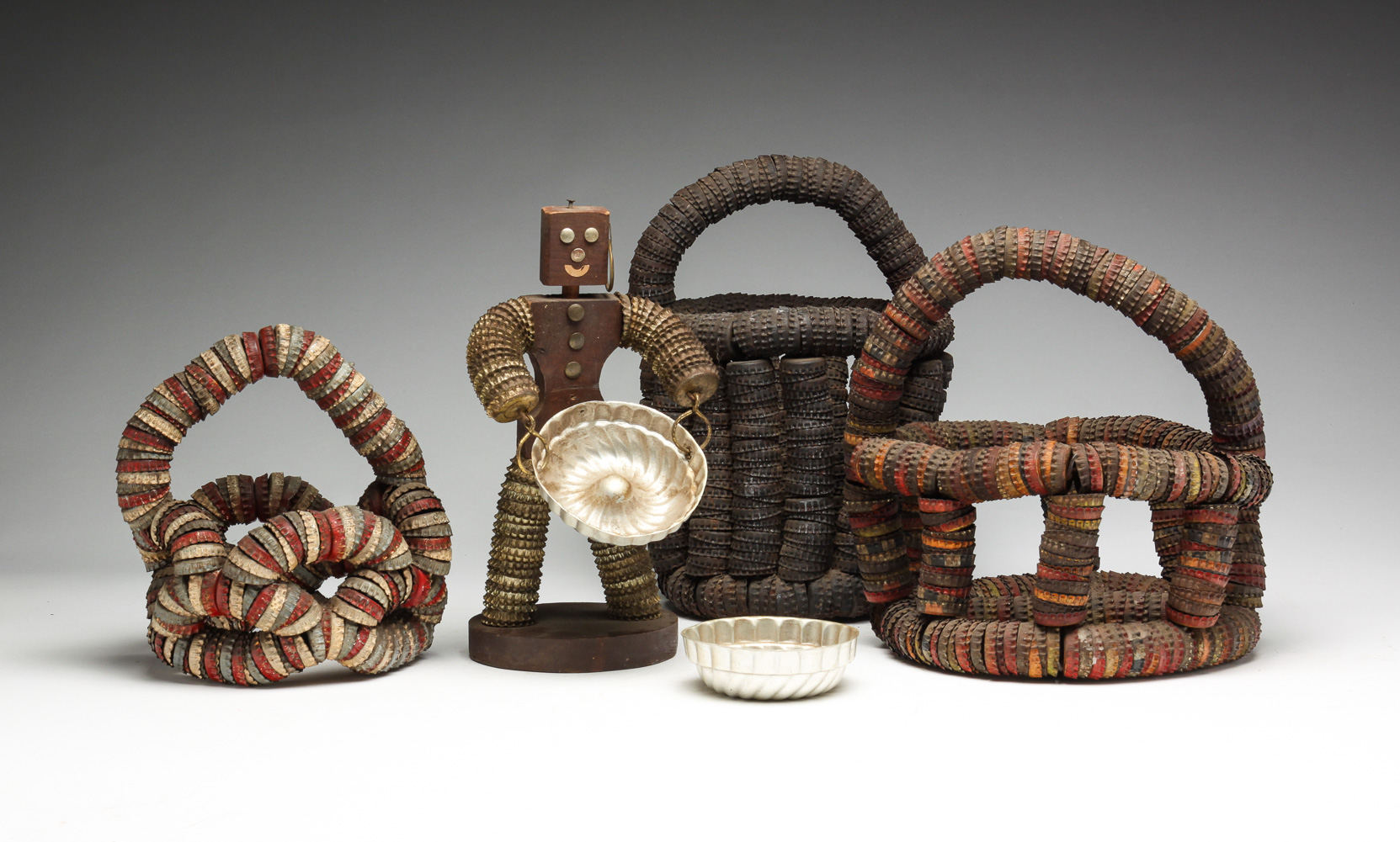 FOUR BOTTLE CAP FOLK ART PIECES.