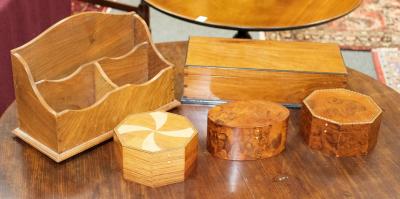 Four boxes and a stationery rack,