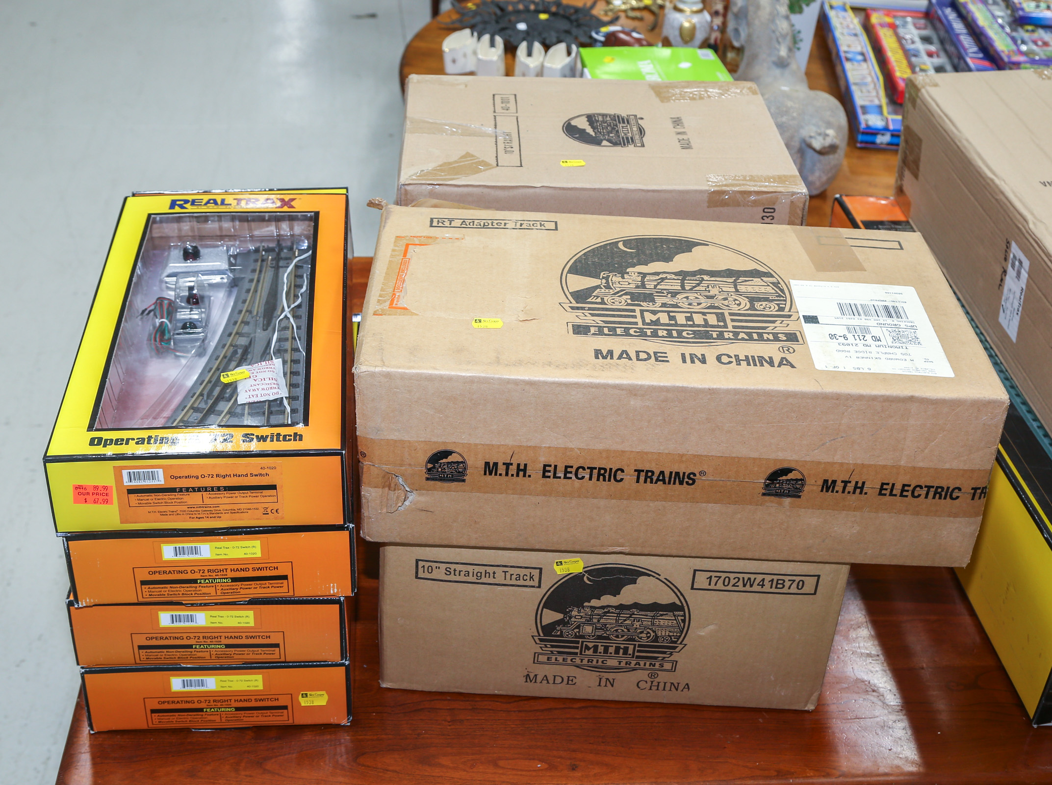 FOUR BOXES OF MTH TACK & FOUR