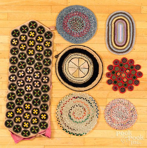 FOUR BRAIDED TABLE MATS, LATE