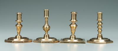 Four brass candlesticks: three with