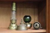 FOUR BRASS LIGHTING DEVICES. I