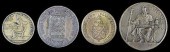FOUR BRASS TOKENS.Four Brass T