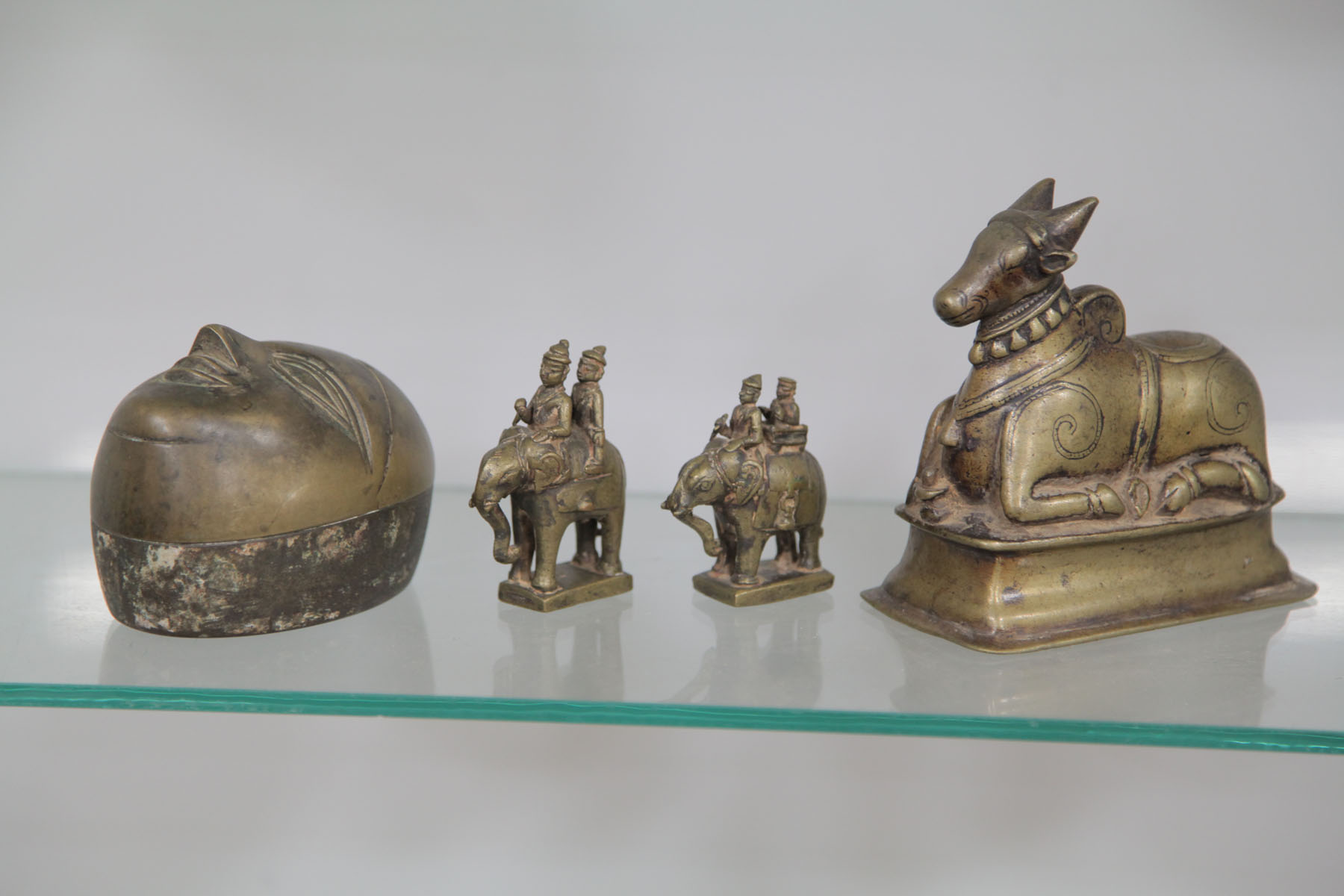 FOUR BRONZE ITEMS.  Bronze