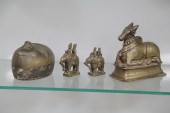FOUR BRONZE ITEMS.  Bronze scu
