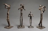 FOUR BRUTALIST STYLE PATINATED