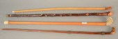 FOUR CANES TO INCLUDE CARVED D