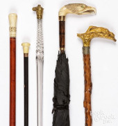 FOUR CANES, TOGETHER WITH A PA