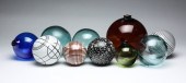 FOUR CARPET BALLS AND SIX FISH