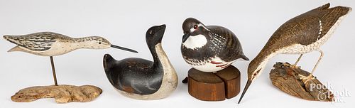 FOUR CARVED AND PAINTED