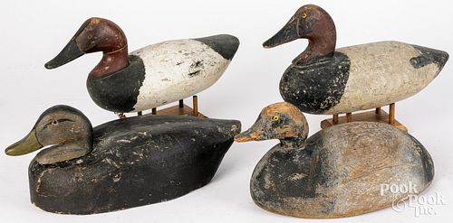 FOUR CARVED AND PAINTED DUCK