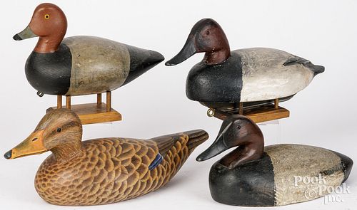 FOUR CARVED AND PAINTED DUCK