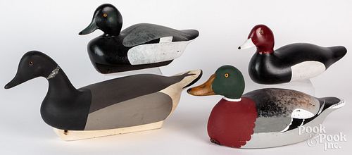 FOUR CARVED AND PAINTED DUCK