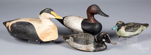 FOUR CARVED AND PAINTED DUCK