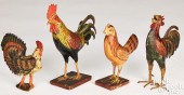 FOUR CARVED AND PAINTED ROOSTE