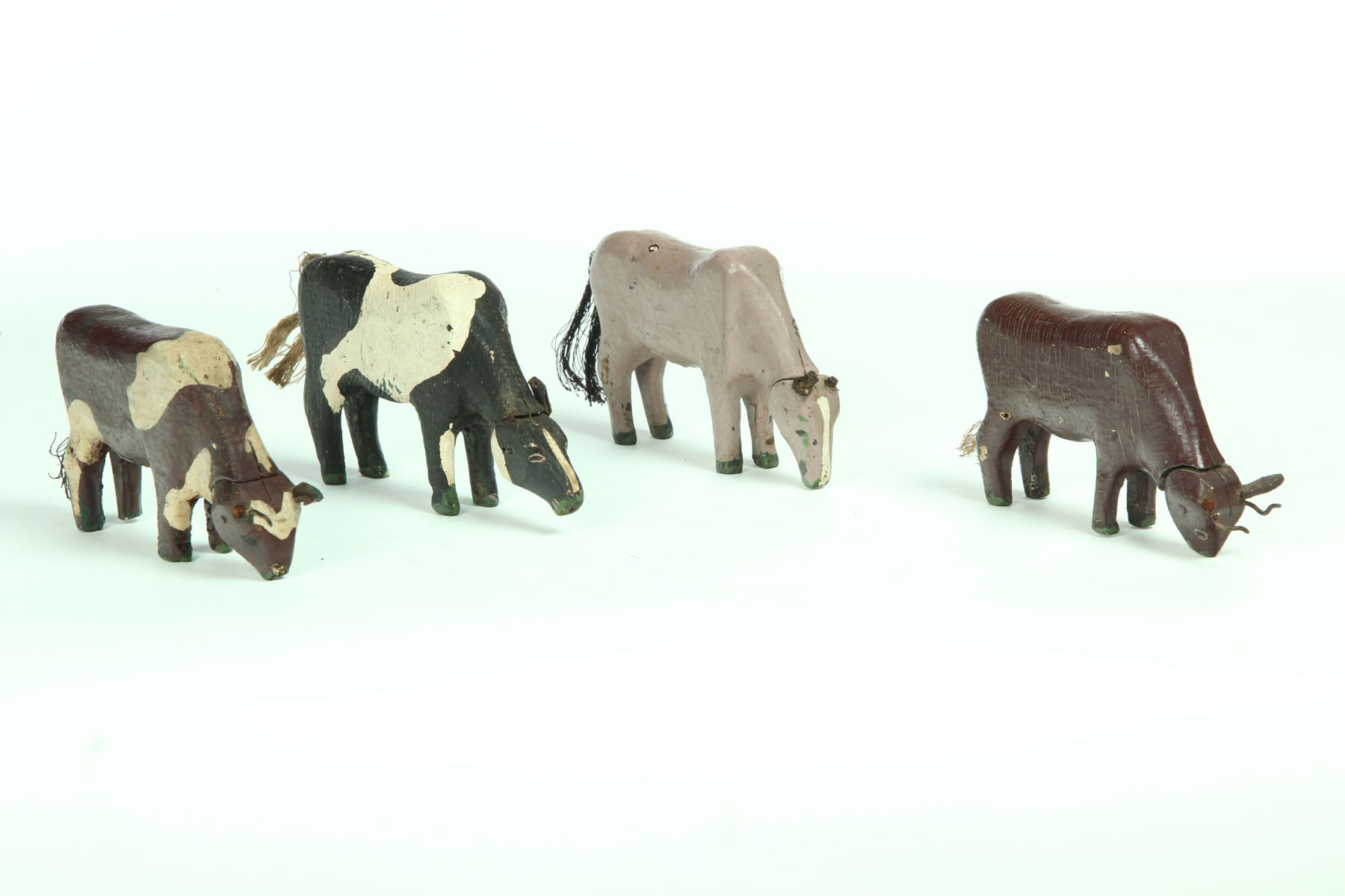 FOUR CARVED ANIMALS.  American 