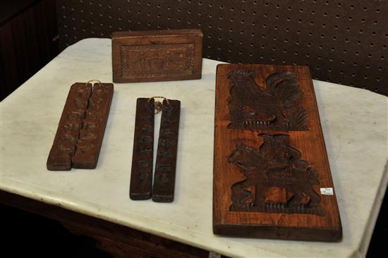 FOUR CARVED FOOD MOLDS. American