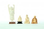 FOUR CARVED IVORY  BUDDHAS.  A