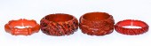 FOUR CARVED ORANGE & RED BAKEL