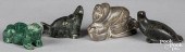 FOUR CARVED STONE FIGURESFour