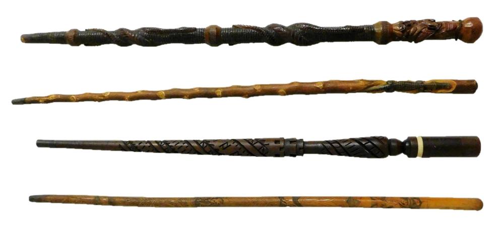 FOUR CARVED WALKING STICKS, LATE