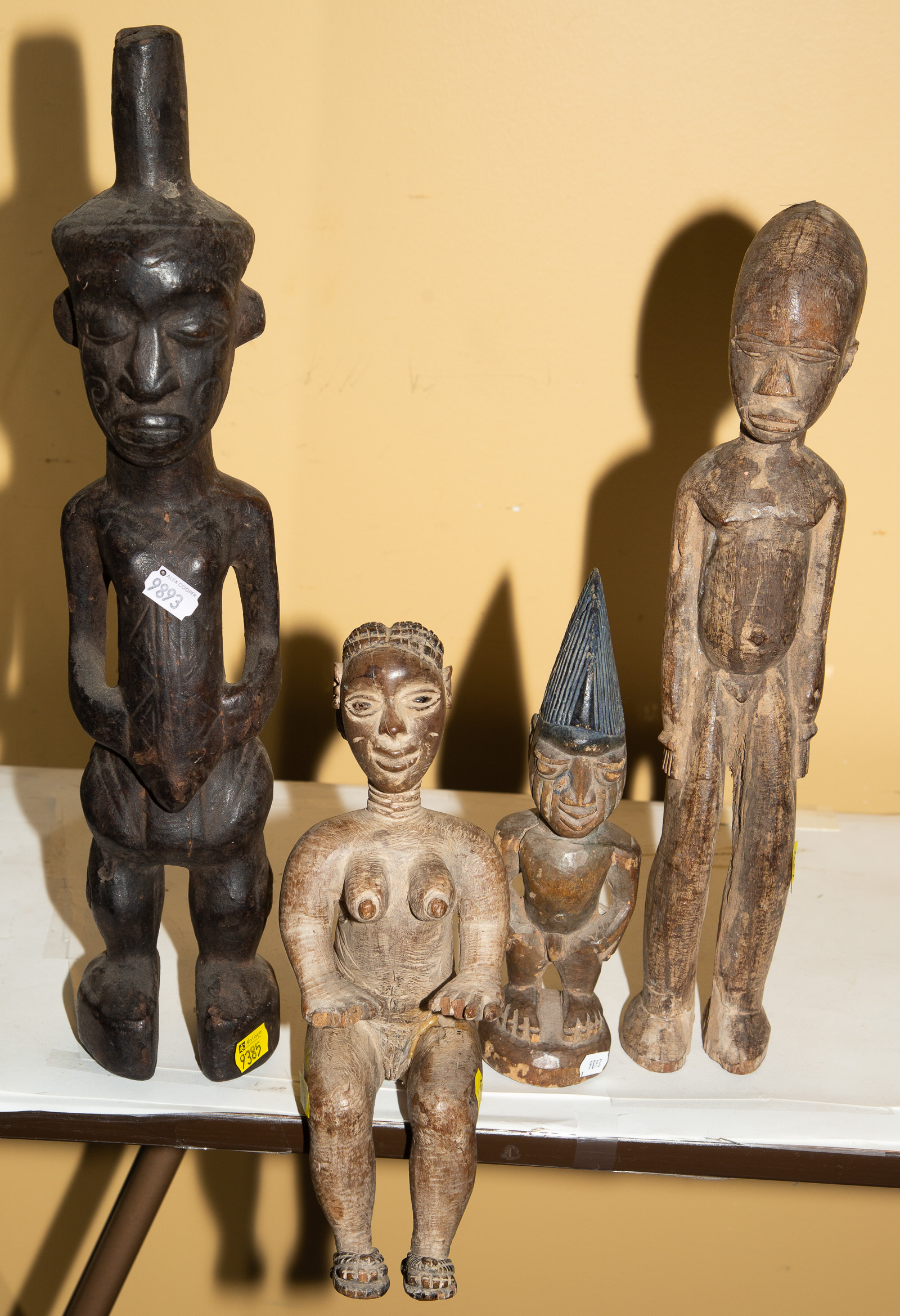 FOUR CARVED WOOD AFRICAN FIGURES