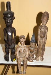 FOUR CARVED WOOD AFRICAN FIGUR