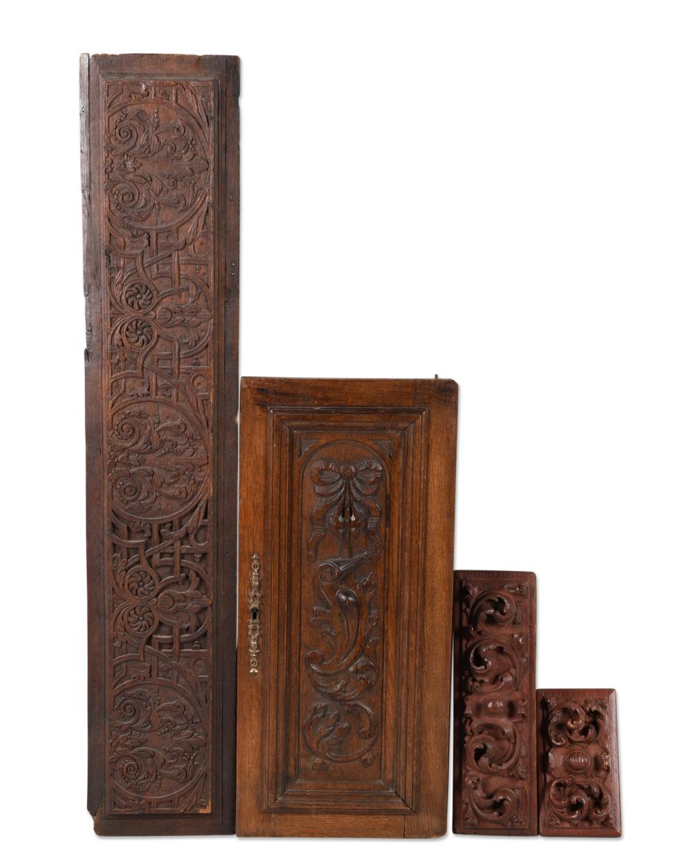 FOUR CARVED WOOD PANELSFOUR