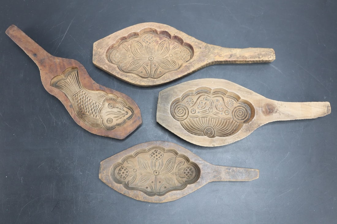 FOUR CARVED WOODED BISCUIT MOLD