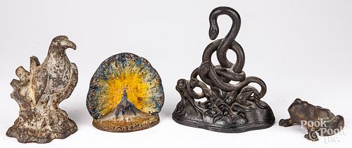 FOUR CAST IRON DOORSTOPSFour cast