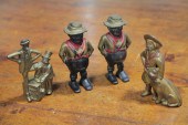 FOUR CAST IRON FIGURAL STILL B