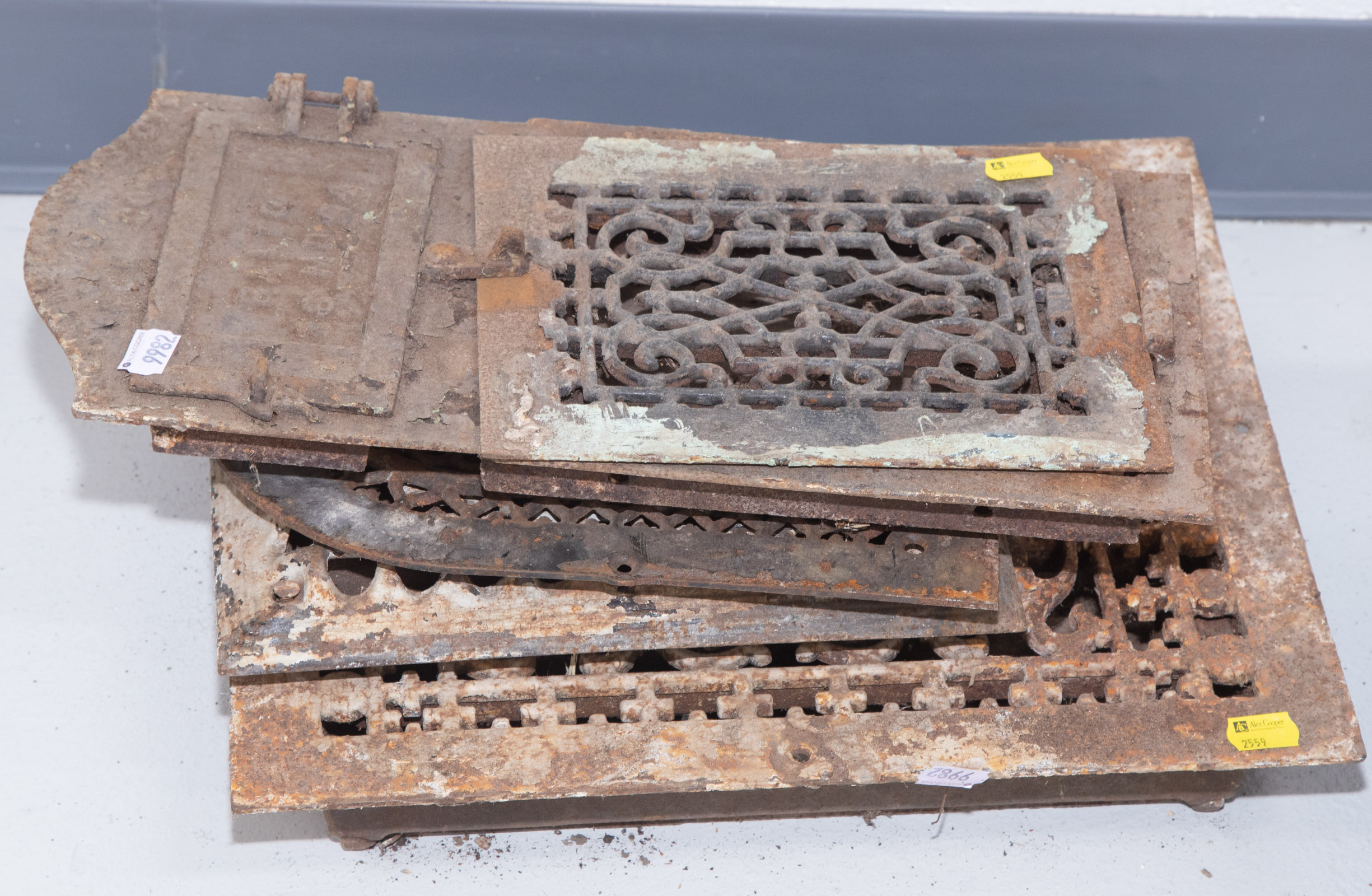 FOUR CAST IRON HEAT GRATES Late