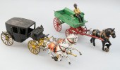 FOUR CAST IRON HORSE-DRAWN TOY