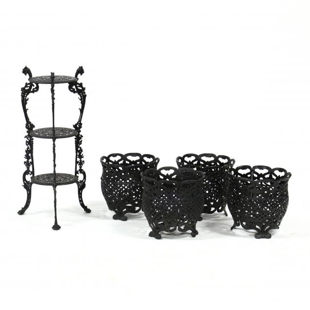 FOUR CAST IRON JARDINIERES AND
